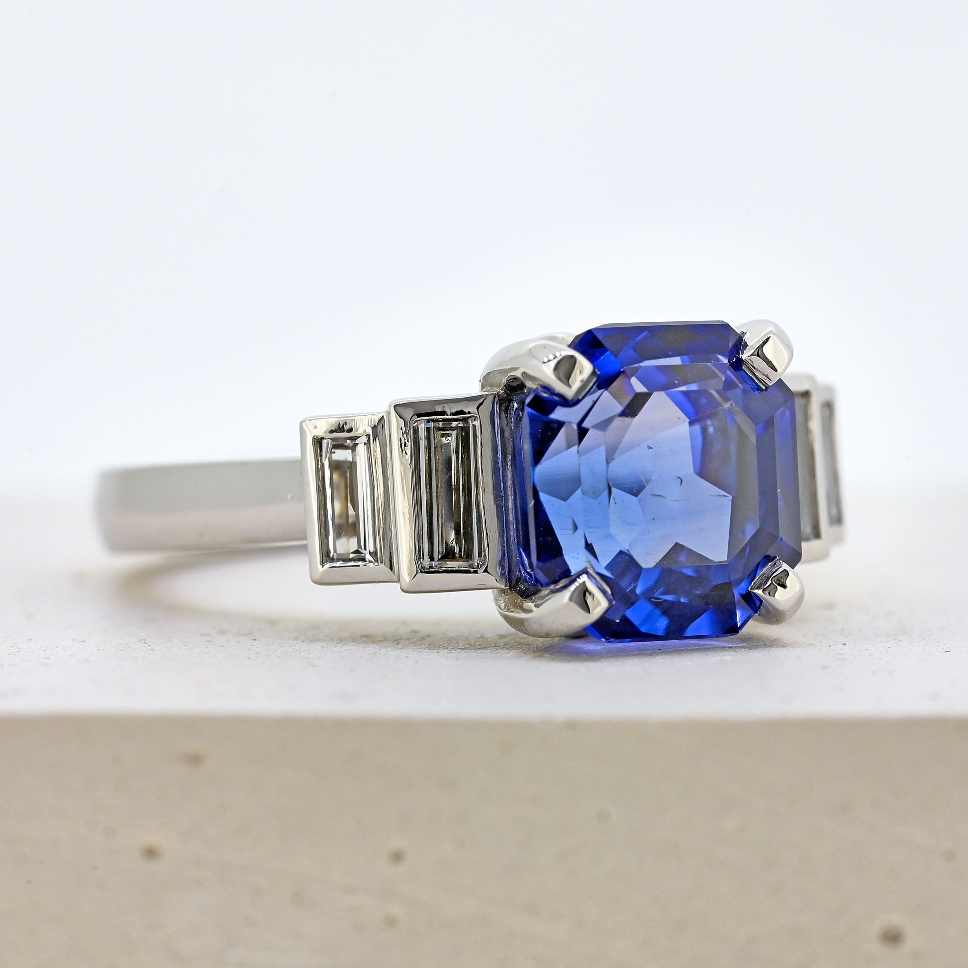 Sapphire and diamond ring, platinum sapphire and diamond ring, sapphires and diamonds, sapphire and diamond, blue sapphire and diamonds, sapphire and diamond engagement, size m sapphire and diamond ring, size 6.5 sapphire and diamond ring, size m platinum sapphire ring, size 6.5 platinum sapphire ring, art deco style ring. Bespoke platinum sapphire and diamond ring