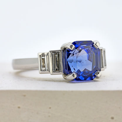 Sapphire and diamond ring, platinum sapphire and diamond ring, sapphires and diamonds, sapphire and diamond, blue sapphire and diamonds, sapphire and diamond engagement, size m sapphire and diamond ring, size 6.5 sapphire and diamond ring, size m platinum sapphire ring, size 6.5 platinum sapphire ring, art deco style ring. Bespoke platinum sapphire and diamond ring
