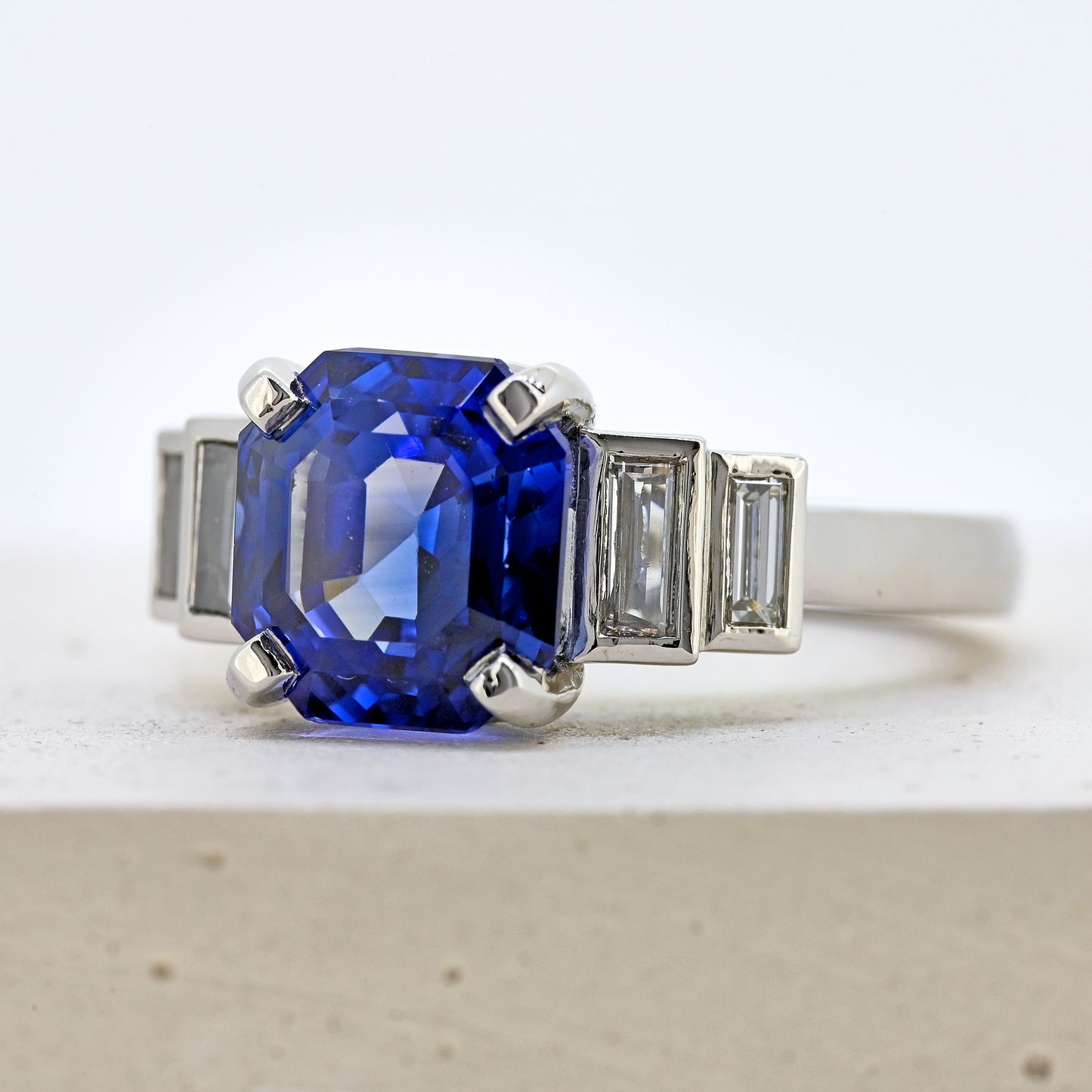 Sapphire and diamond ring, platinum sapphire and diamond ring, sapphires and diamonds, sapphire and diamond, blue sapphire and diamonds, sapphire and diamond engagement, size m sapphire and diamond ring, size 6.5 sapphire and diamond ring, size m platinum sapphire ring, size 6.5 platinum sapphire ring, art deco style ring. Bespoke platinum sapphire and diamond ring