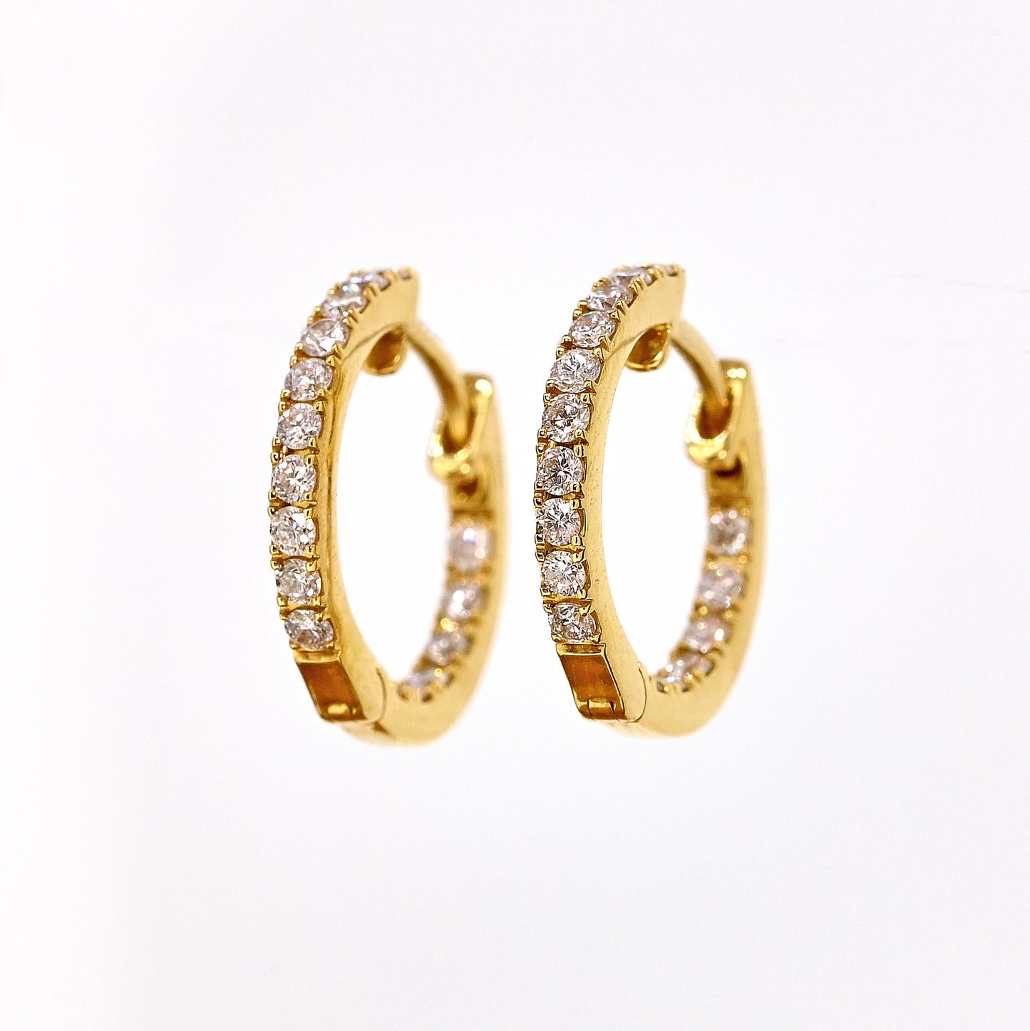 Diamond hoops, yellow gold diamond hoops, diamonds set inside and outside, diamond earrings, yellow gold and diamond earrings, diamond hoops with hinge, hinged earrings, hinged hoops
