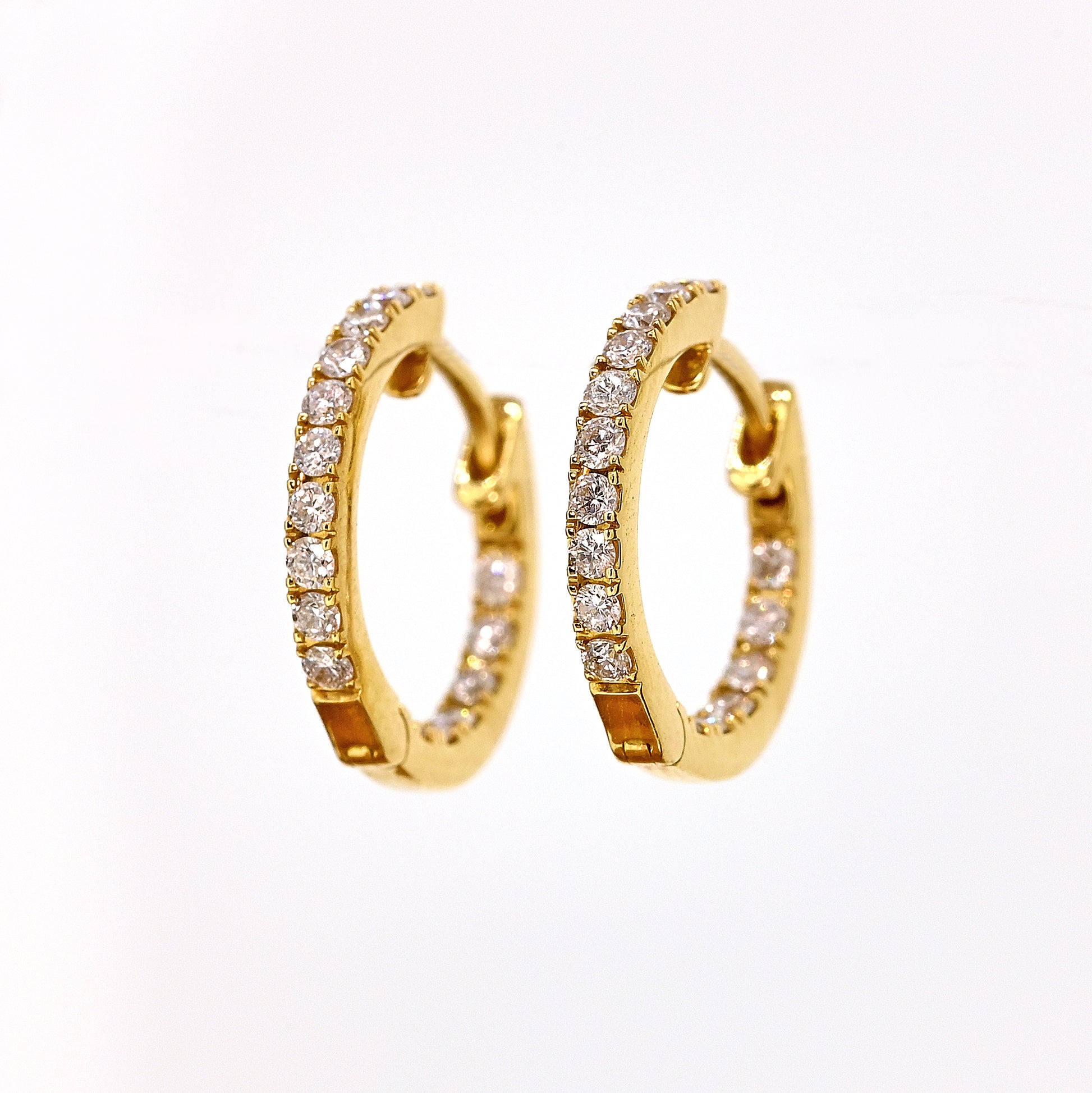 Diamond hoops, yellow gold diamond hoops, diamonds set inside and outside, diamond earrings, yellow gold and diamond earrings, diamond hoops with hinge, hinged earrings, hinged hoops