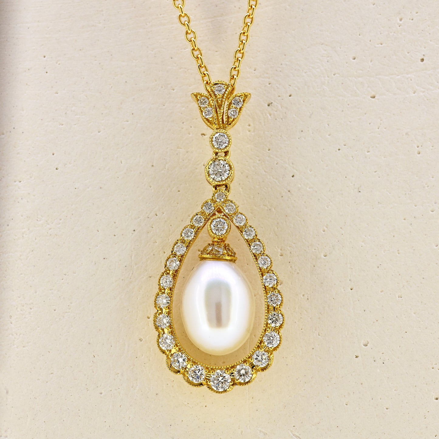 Pearl necklace, diamond and pearl necklace, pearl and diamond necklace, free hanging pearl, hanging pearl, free hanging pearl necklace, 18ct pearl necklace, 18ct pearl and diamond necklace