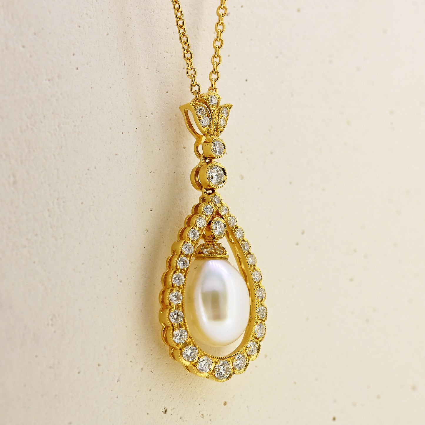 Pearl necklace, diamond and pearl necklace, pearl and diamond necklace, free hanging pearl, hanging pearl, free hanging pearl necklace, 18ct pearl necklace, 18ct pearl and diamond necklace