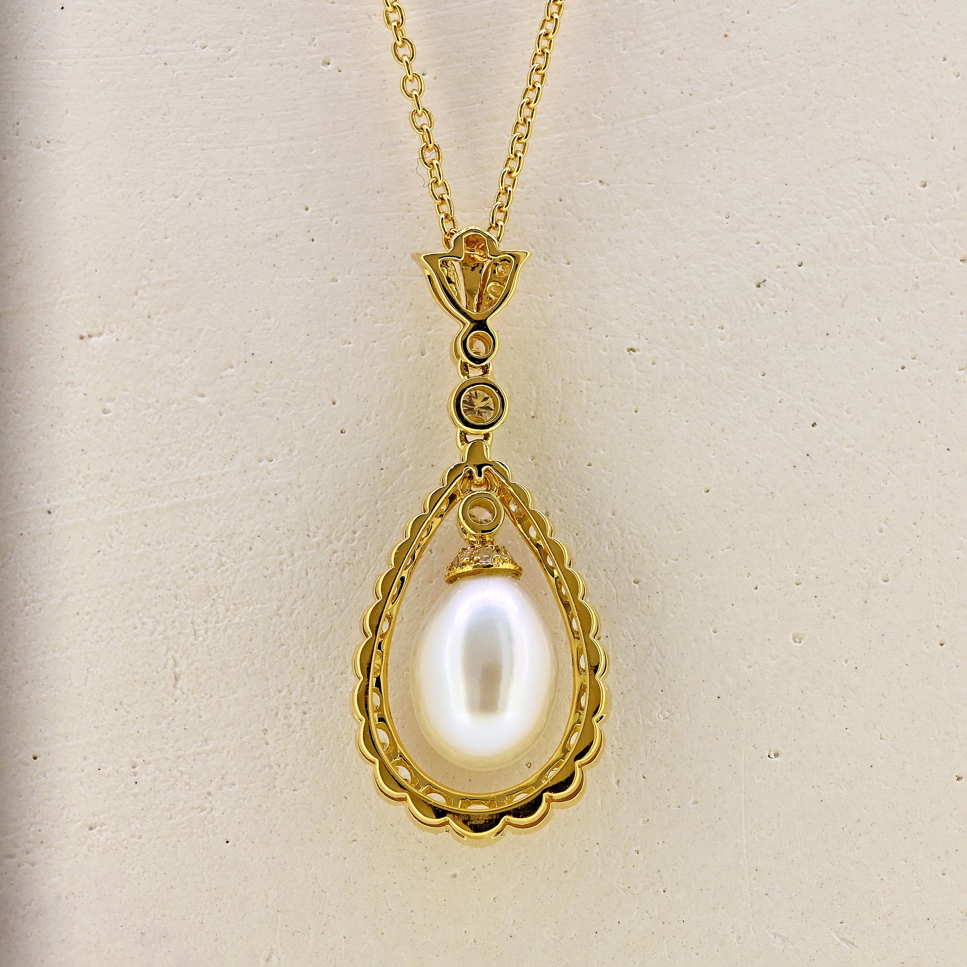 Pearl necklace, diamond and pearl necklace, pearl and diamond necklace, free hanging pearl, hanging pearl, free hanging pearl necklace, 18ct pearl necklace, 18ct pearl and diamond necklace
