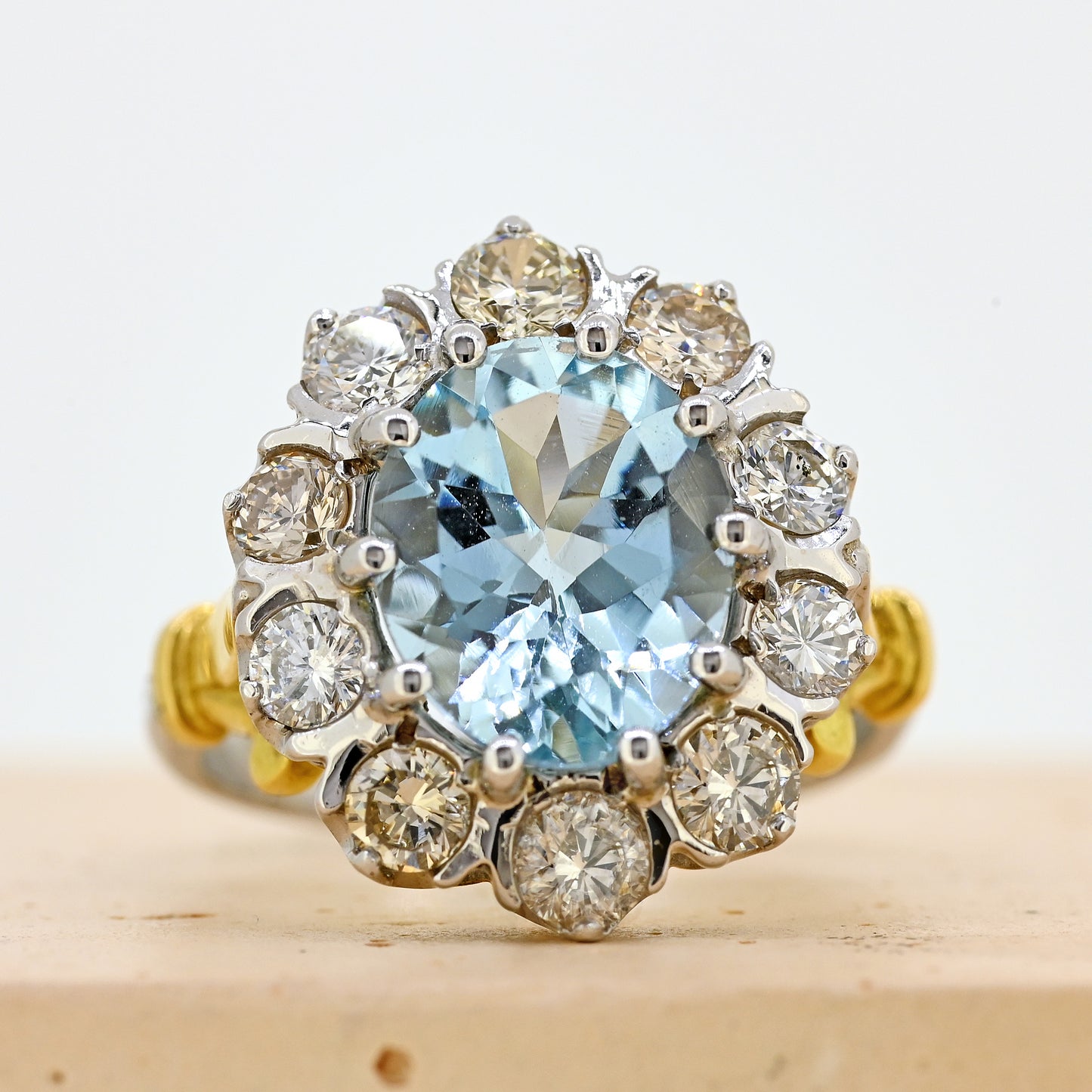 aquamarine and diamond ring, aqua and diamond ring, two colour gold aquamarine ring, aquamarine diamond cluster ring, white gold aquamarine ring, white gold aquamarine and diamond cluster ring