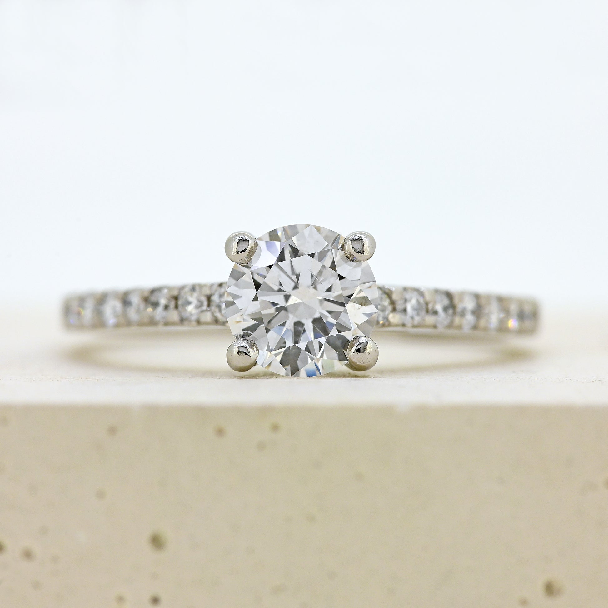 diamond solitaire, platinum and diamond solitaire, certified diamond, diamond set shoulders, simple diamond ring, simple diamond solitaire, colour d diamond