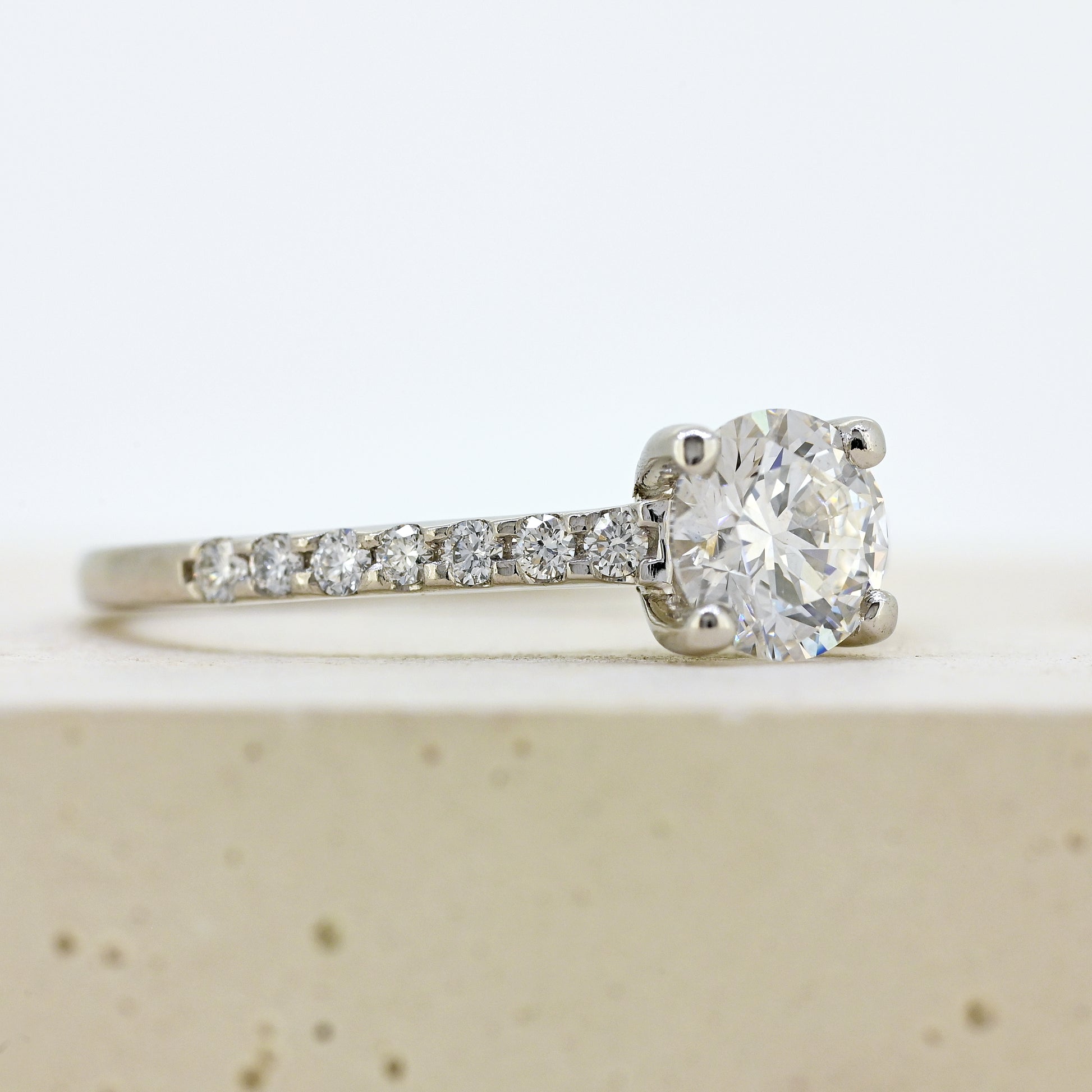 diamond solitaire, platinum and diamond solitaire, certified diamond, diamond set shoulders, simple diamond ring, simple diamond solitaire, colour d diamond